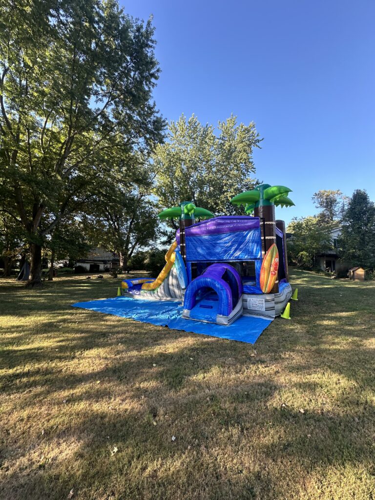 a inflatable bounce house in a grassy area